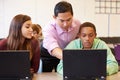 High School Students With Teacher In Class Using Laptops Royalty Free Stock Photo