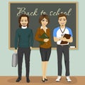 High school teachers standing in front of chalkboard