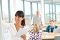 High school - three students with mature professor Royalty Free Stock Photo