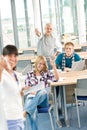 High school - three students with professor Royalty Free Stock Photo