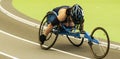 Wheelchair athlete racing the mile indoors