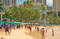 Waikiki Beach, HI, USA - July 29, 2019: Crowded beach in Waikiki, Hawaii.