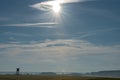 High seat in a autumn landscape of blue sky with sun and bright sunbeams