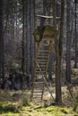 High seat of the hunter in front of the edge of the forest in Czech Republic