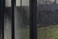 Security: Woven wire mesh fencing at a water pumping station. 1 Royalty Free Stock Photo