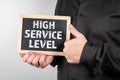 High Service Level. Man shows a thumb up Royalty Free Stock Photo