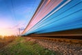 High speed blue passenger train in motion