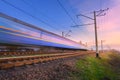 High speed blue passenger train in motion Royalty Free Stock Photo