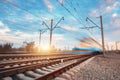 High speed blue passenger train in motion