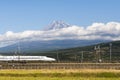 High Speed Bullet Train Tokaido Shinkansen and Fuji mountain with rice field, Fuji, Shizuoka, Japan Royalty Free Stock Photo