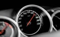 High speed on a car speedometer and motion blur.