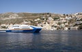 High Speed Catamaran Arrives at Main Port of Symi in Greece Royalty Free Stock Photo