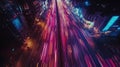 A high-speed drone captures vibrant light trails in a bustling urban environment during nighttime Royalty Free Stock Photo