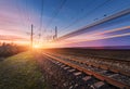 High speed passenger train in motion at sunset Royalty Free Stock Photo