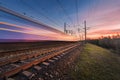 High speed passenger train in motion at sunset Royalty Free Stock Photo