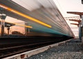 High speed passenger train on tracks with motion blur effect