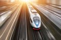 High-speed passenger train travels at high speed. Top view with motion effect, greased background. Royalty Free Stock Photo