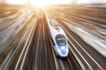 High-speed passenger train travels at high speed. Top view with motion effect, greased background.