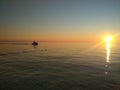 High speed boat and sunset