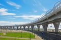 High-speed road car over the waterfront park pedestrian zone in the city. Royalty Free Stock Photo