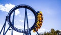High-Speed Roller Coaster Loop Against a Blue Sky Royalty Free Stock Photo