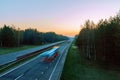 High-speed traffic on the highway in the early morning Royalty Free Stock Photo