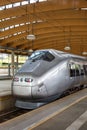 High-speed train Flytoget at Oslo Airport Lufthavn railway station portrait format in Norway Royalty Free Stock Photo