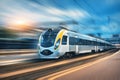 High speed train in motion at the railway station Royalty Free Stock Photo