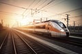 High speed train in motion on the railway station at sunset Royalty Free Stock Photo