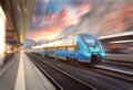 High speed train in motion at the railway station Royalty Free Stock Photo