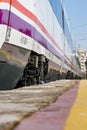 High speed train parked on the track awaiting its departure seen from a low plane at the platform Royalty Free Stock Photo