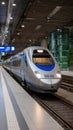 High Speed Train at Terminal Platform Arrival Silver and Blue Railway Vehicle Royalty Free Stock Photo