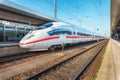 High speed white train on the railway station Royalty Free Stock Photo