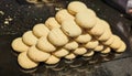 High Stack of Golden Homemade Shortbread Cookies on Dark Surface Royalty Free Stock Photo
