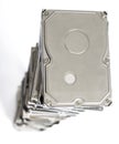 High stack of used hard drives