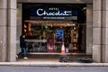 High Street Retailer Hotel Chocolat Shop Front with A Person Walking By
