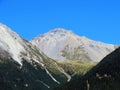 High swiss alpine peak Lenzerhorn (2906 m) above the tourist-agricultural village Alvaneu Bad (Alvagni Bogn)