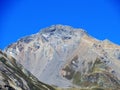 High swiss alpine peak Lenzerhorn (2906 m) above the tourist-agricultural village Alvaneu Bad (Alvagni Bogn)