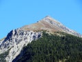 High swiss alpine peak Muchetta (2623 m) above the tourist-agricultural village Alvaneu Bad (Alvagni Bogn)