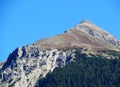 High swiss alpine peak Muchetta (2623 m) above the tourist-agricultural village Alvaneu Bad (Alvagni Bogn)