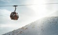 High Tatras cabine gondola rope way carrying a skiers to the mountain top. Active winter skiing and snowboarding concept image Royalty Free Stock Photo