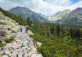 High Tatras (Slovakia) summer view and family on footway. Royalty Free Stock Photo