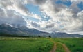 High Tatras Vysoke Tatry mountains landscape shot with the country road,grazing sheep herds. Lomnicky stit Lomnica Peak 2634m