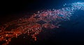 High-Tech Abstract Digital Circuit Board with Luminous Orange Data Pathways and Microchips, Showcasing Advanced Technology and Royalty Free Stock Photo