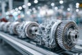 High-tech automatic transmission components arranged on assembly line inside modern factory with blurred industrial background and Royalty Free Stock Photo