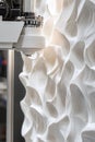 High-tech 3D printing robot creating a detailed facade for a modern commercial building