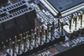 High tech dark background with elements of a computer motherboard in soft focus Royalty Free Stock Photo