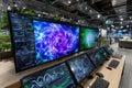 High-tech data center with advanced monitors displaying dynamic visualizations of data Royalty Free Stock Photo