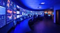 High-tech financial trading room with multiple monitors displaying stock market data and analytics