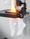 Advanced Flammability Test on Textile Socks Royalty Free Stock Photo